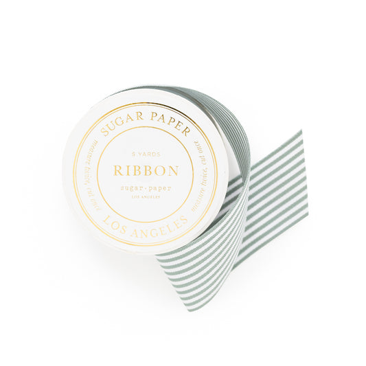 Packaged green and white stripe ribbon spool with 'Sugar Paper' on label