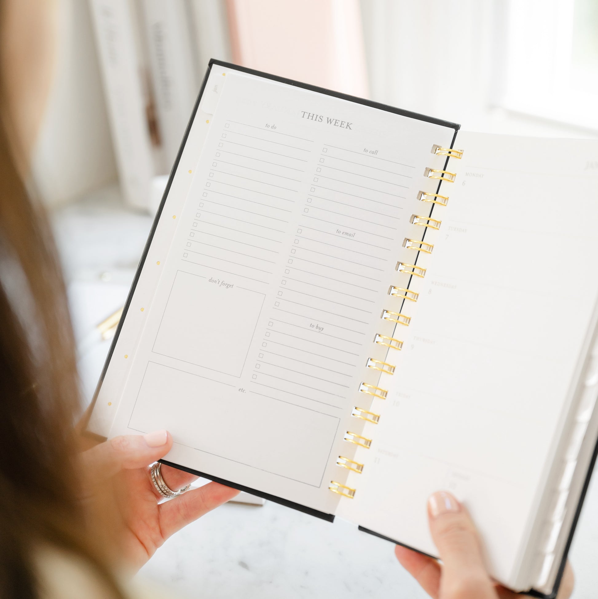 Small planner open to weekly guided page