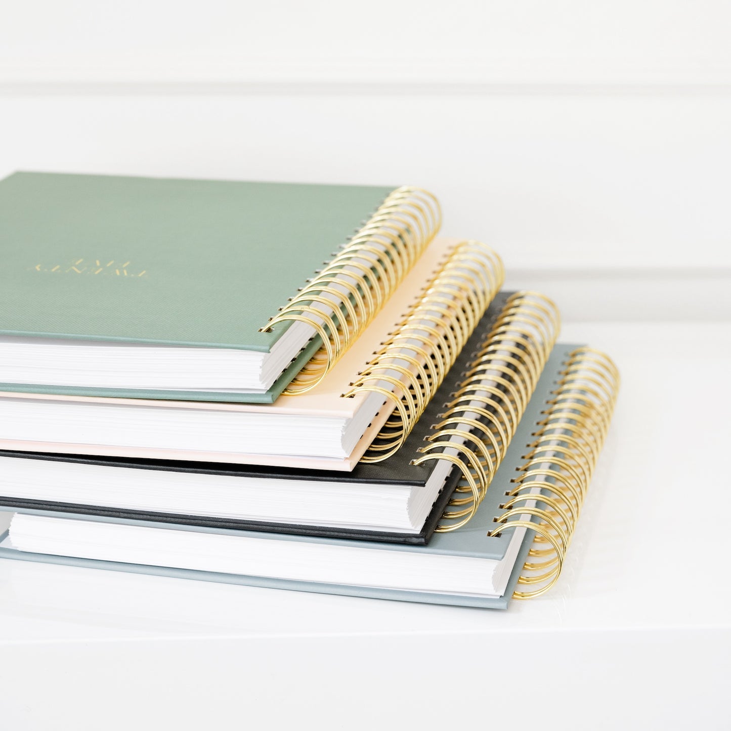 Stack of Spiral Planners showing spiral