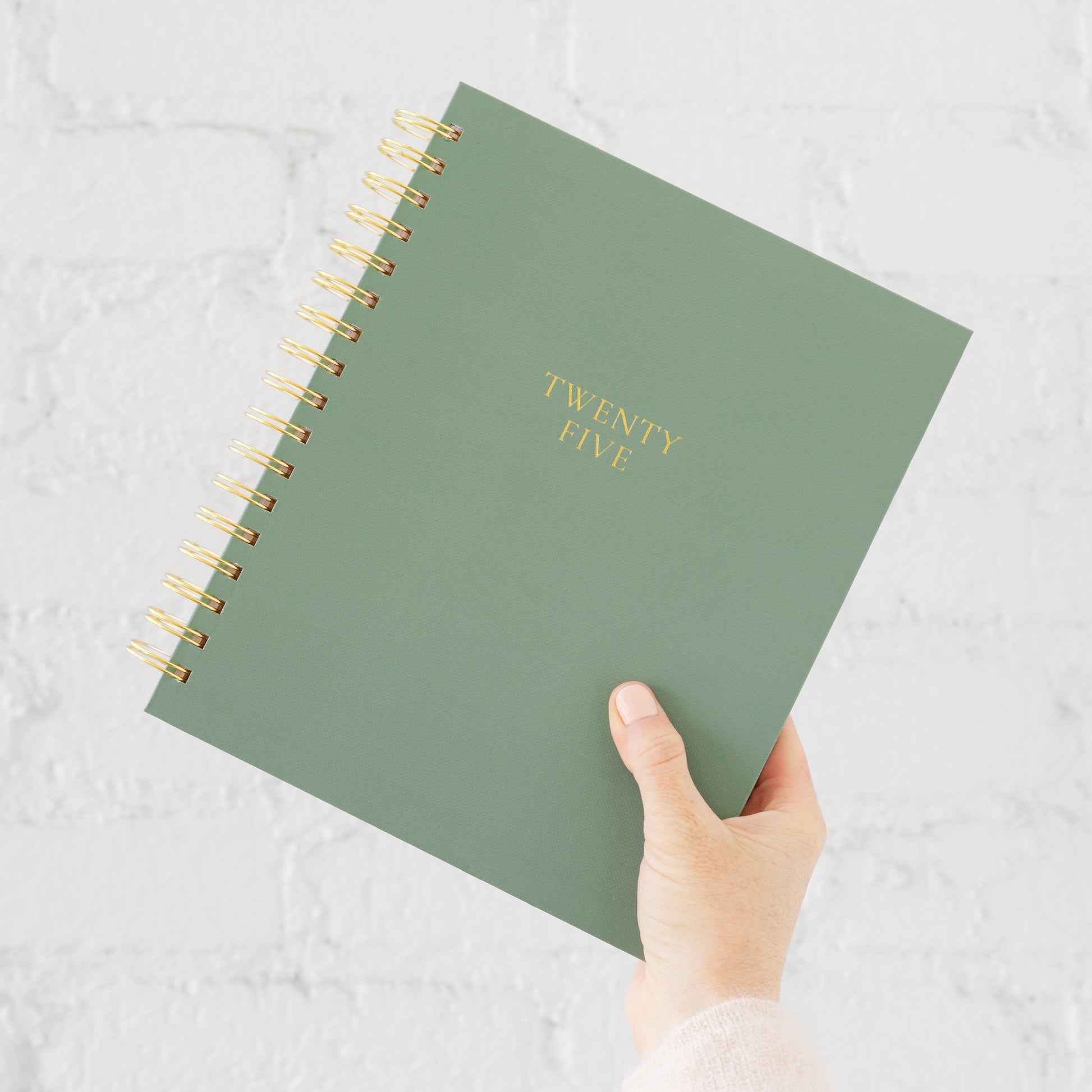 Sage Green Spiral Planner in Hand