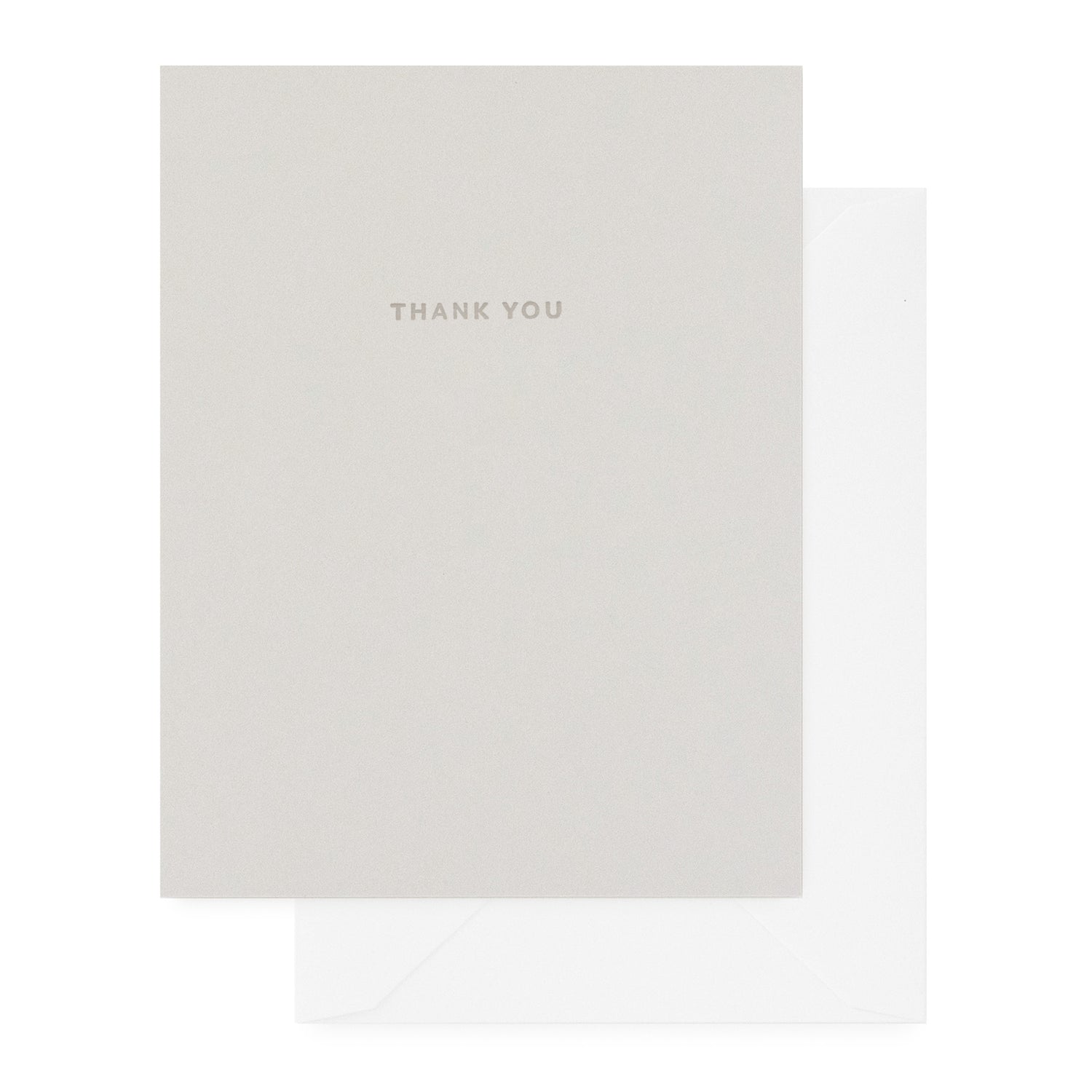 Grey thank you card with dark grey 'thank you' text paired with a white envelope}