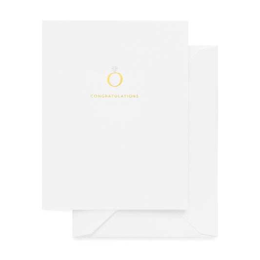 White card foil printed with a gold foil engagement ring and congratulations