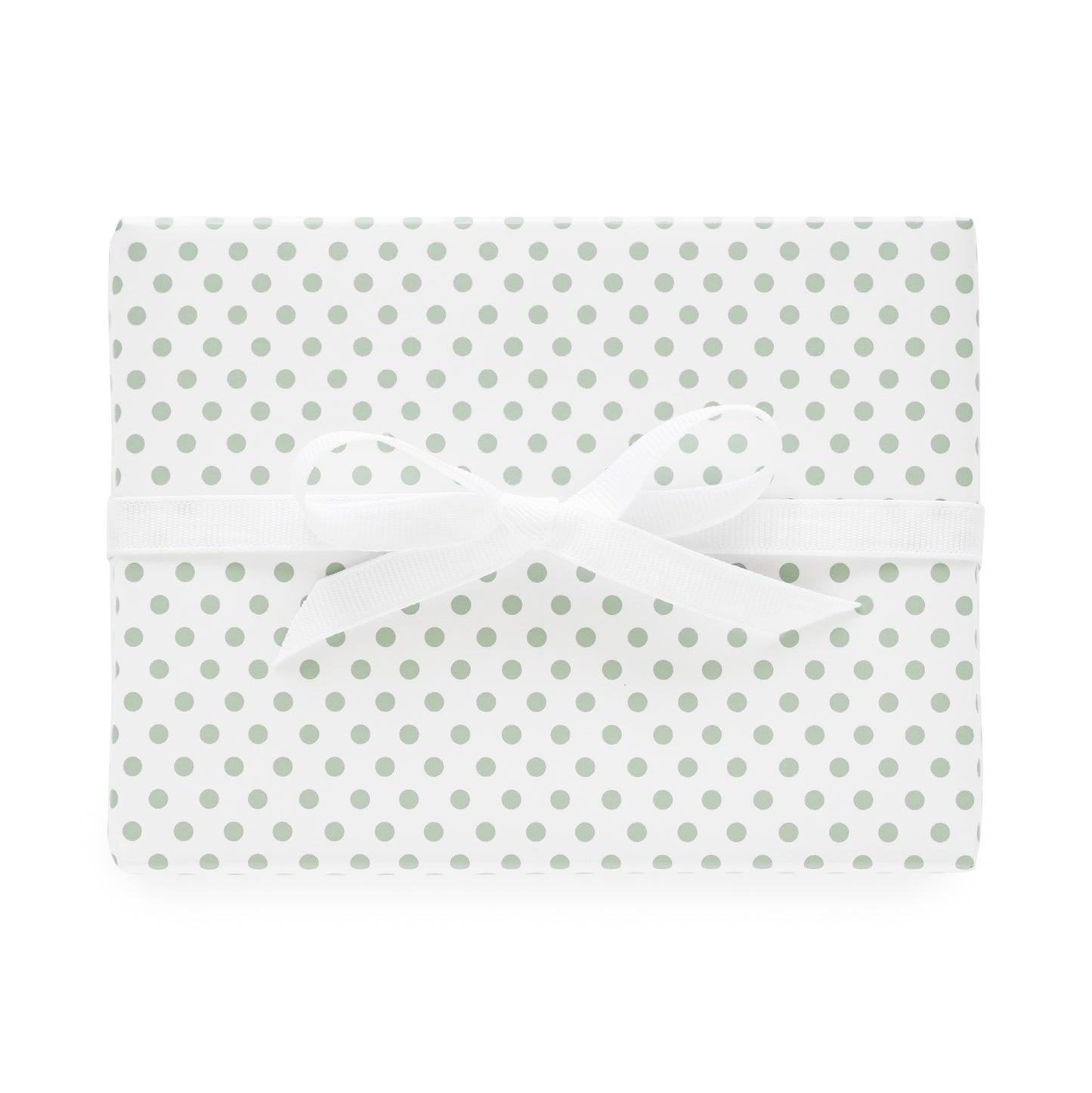 White and green dot wrapping paper wrapped package with white bow