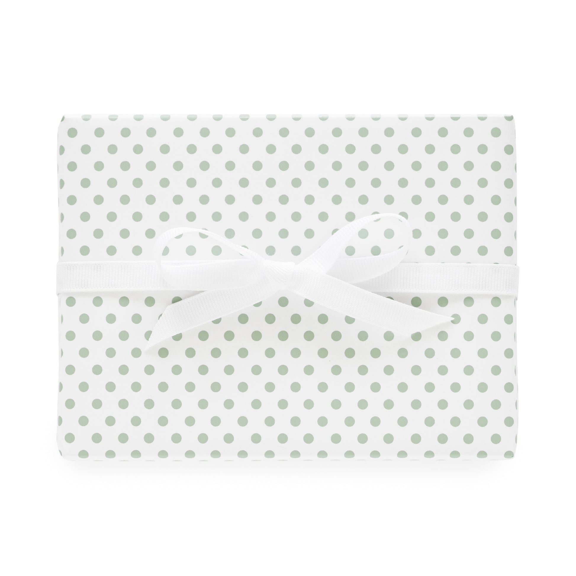 White and green dot wrapping paper wrapped package with white bow