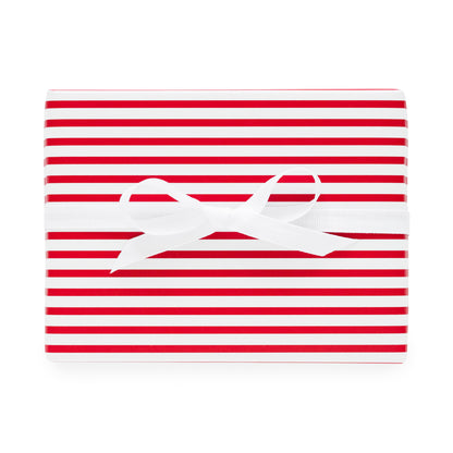 Red and white stripe wrapping paper with white ribbon bow