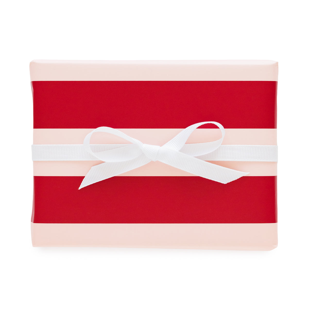 A rectangular gift box wrapped in red and pale pink striped paper with a white ribbon bow