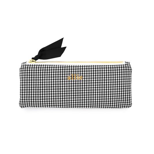Black and white checkered pouch with gold zipper and 'allie' embroidery in mustard yellow