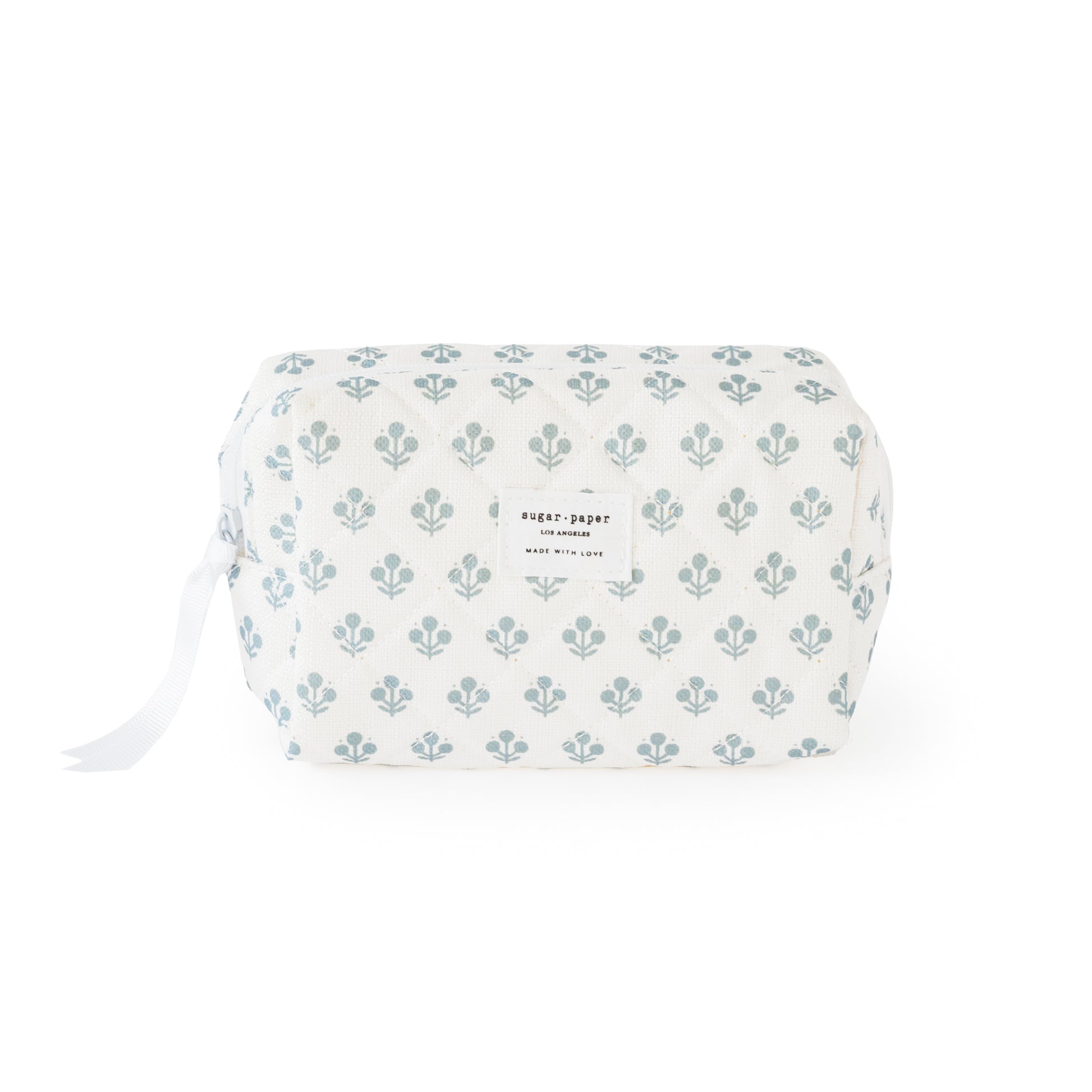 White and blue floral cosmetic pouch with white ribbon pull and zipper