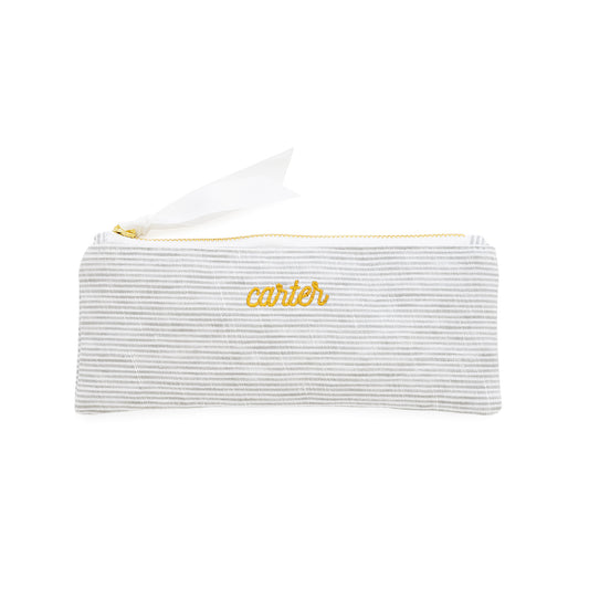 Striped pouch with 'carter' embroidery in mustard thread