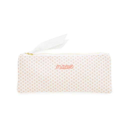 Pink polka dot pencil case with 'maeve' in pink embroidery