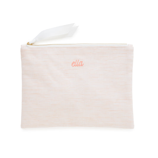 Pink pouch with 'ella' embroidery on a white background