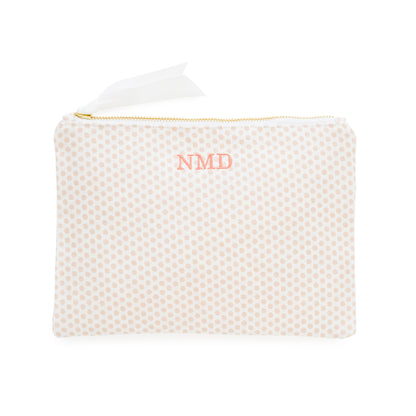 Pink dot pouch with 'NMD' initials in pink thread