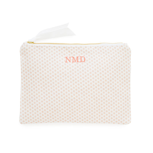Pink dot pouch with 'NMD' initials in pink thread