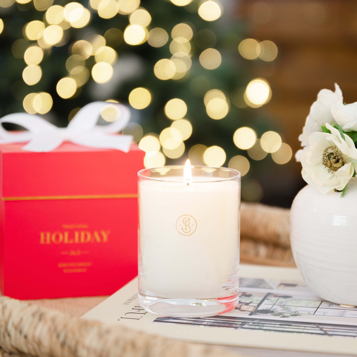 lit candle with red box