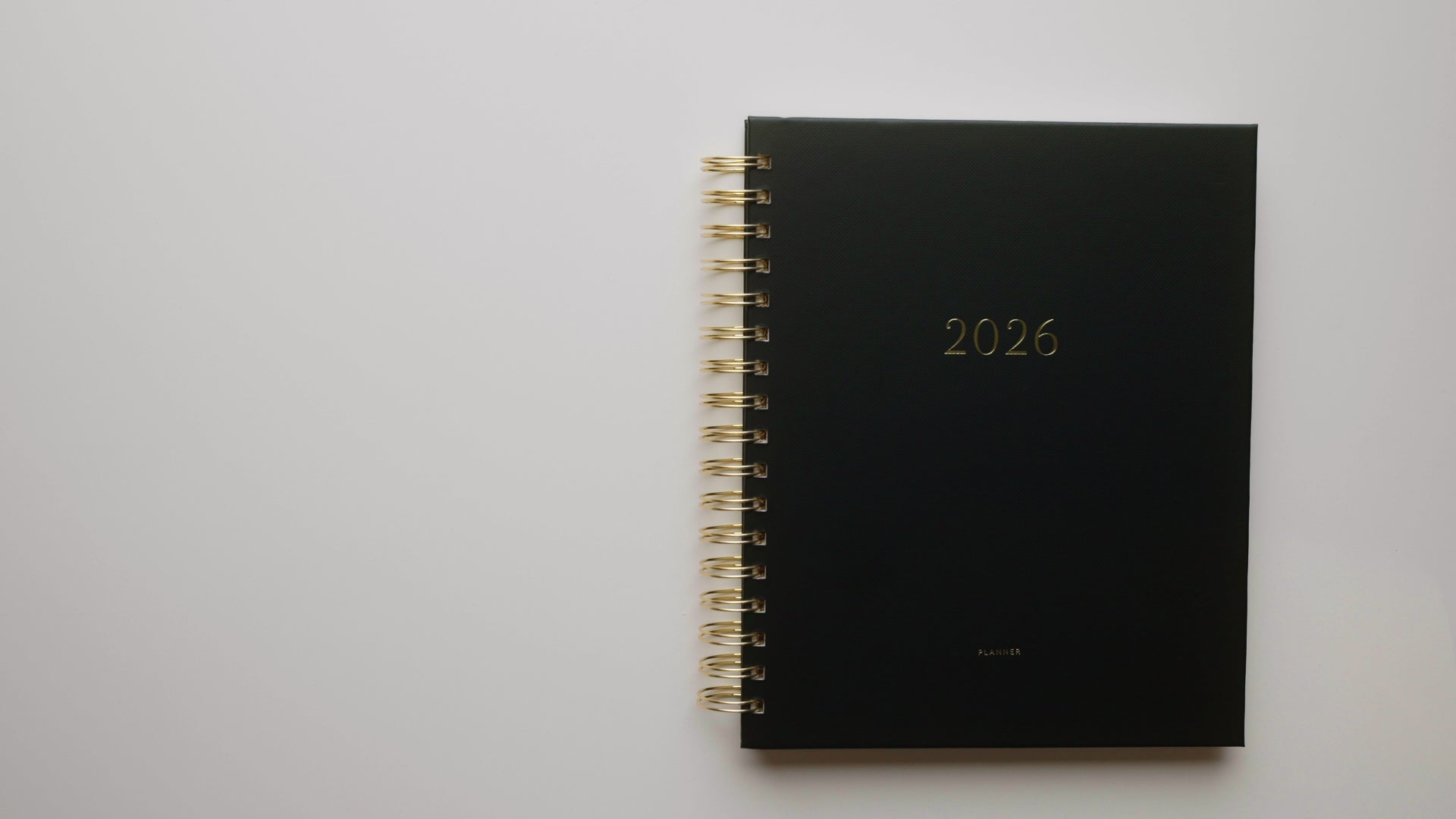 Load video: Interior of black 2026 signature spiral planner