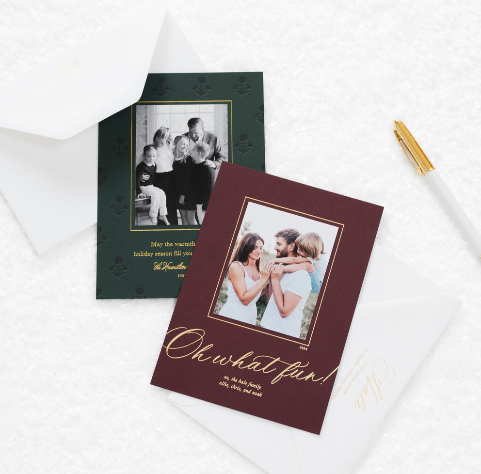 A maroon and dark green custom holiday photo card on white background.