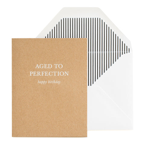 Kraft and white birthday card with black striped envelope liner