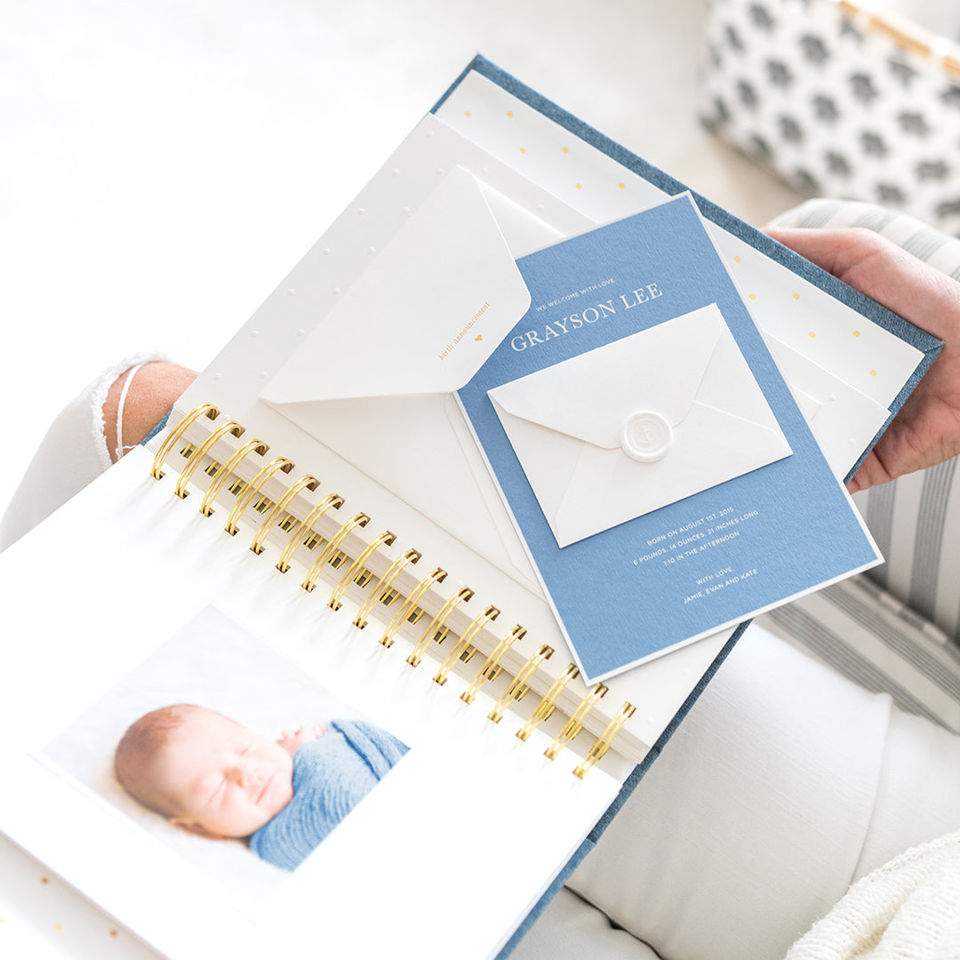This is the interior of the baby book to hold your baby announcement. #color_chambray