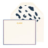 cream card with navy and red border and gold text, cream envelope with navy leopard liner