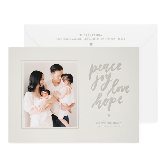 grey card with photo and grey ink, white envelope with grey ink