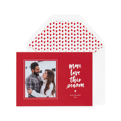 red card with photo and white text, white envelope with red heart liner