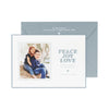white card with photo and slate blue text, slate blue envelope with white text