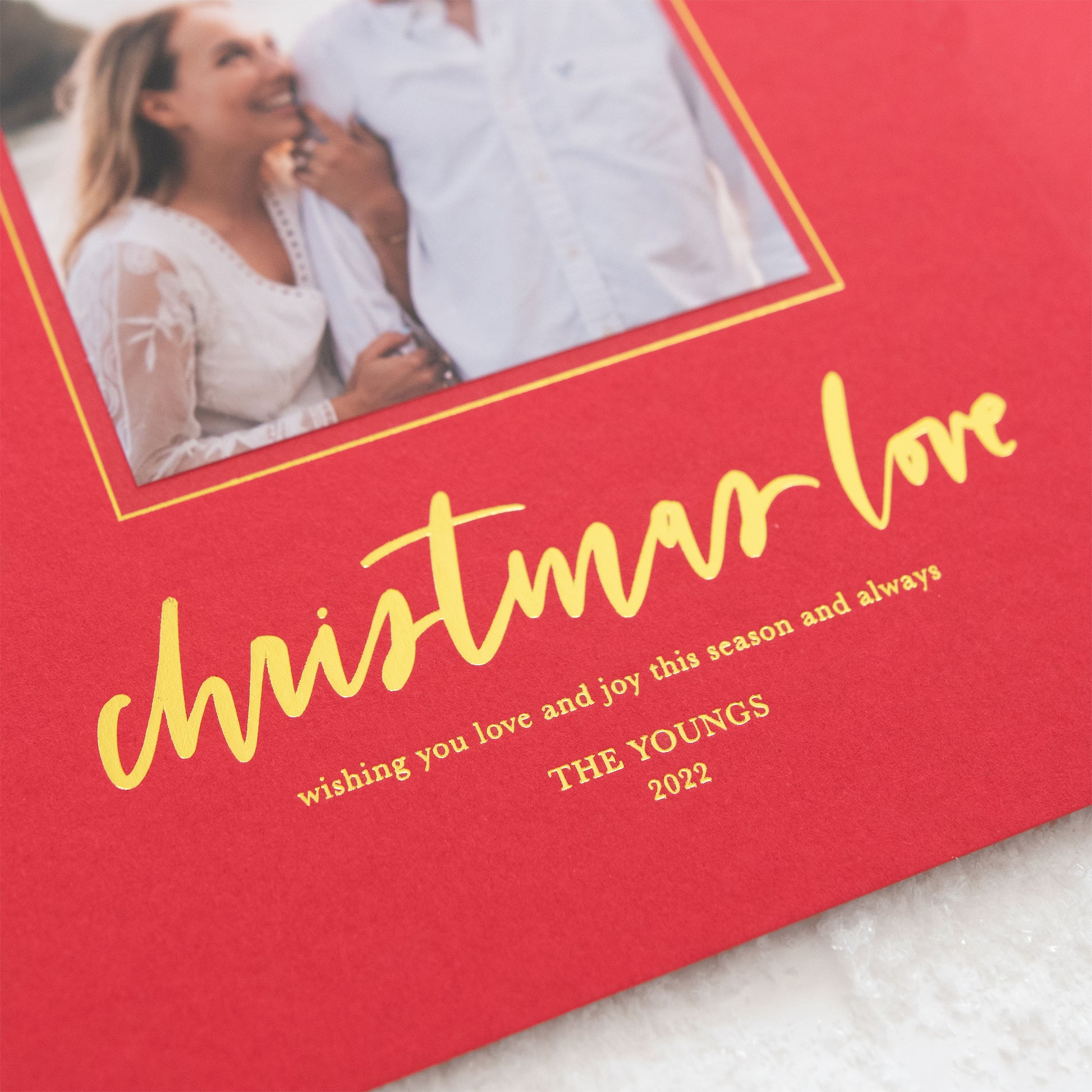 close up of brushed christmas love card