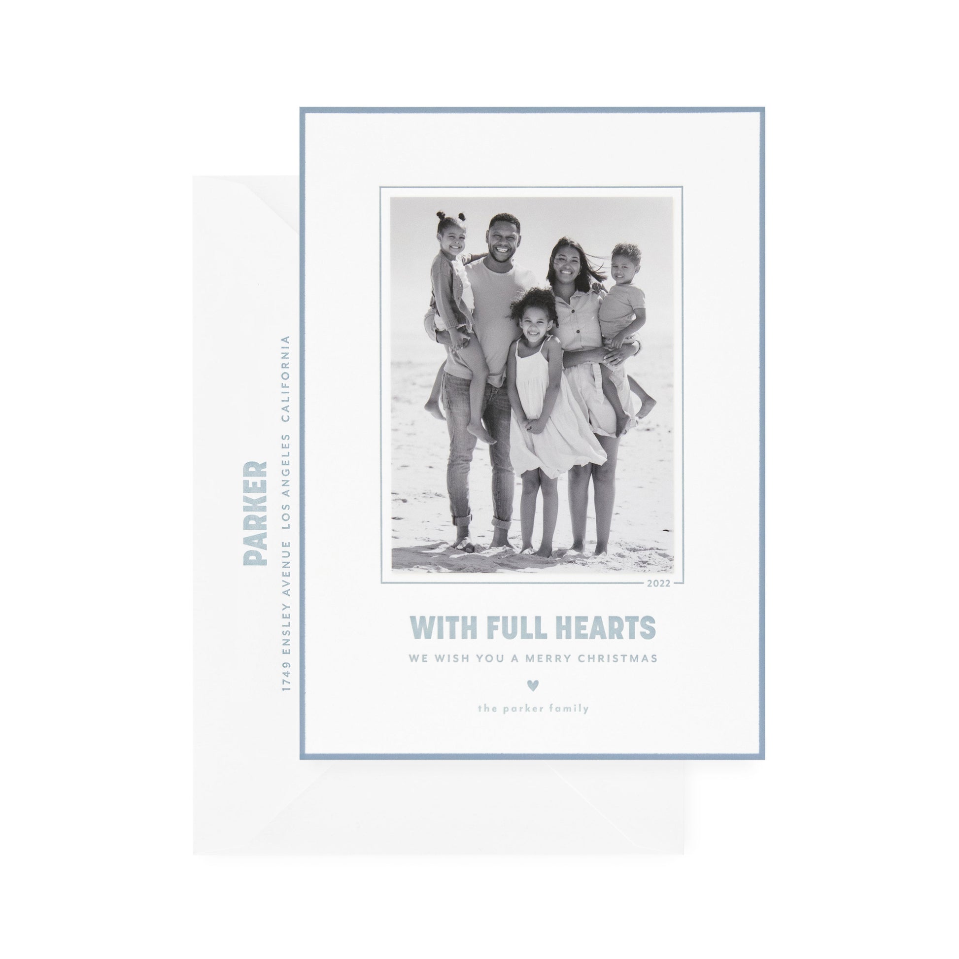 white card with photo, slate blue text and border, white envelope with slate blue text
