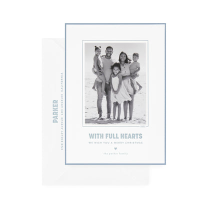 white card with photo, slate blue text and border, white envelope with slate blue text