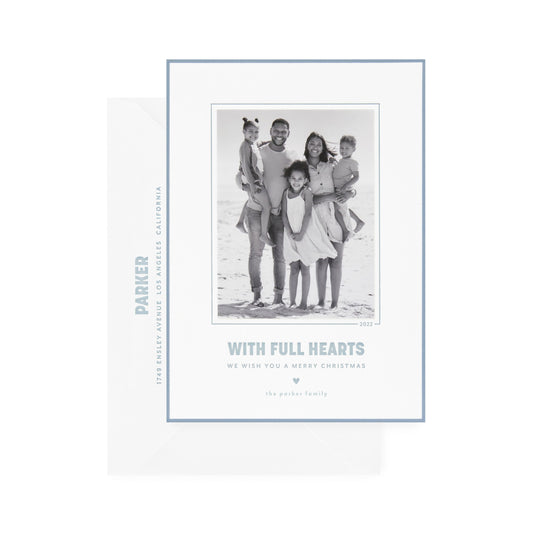 white card with photo, slate blue text and border, white envelope with slate blue text