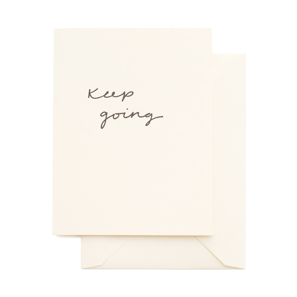 Cream greeting card printed with black ink "Keep Going"