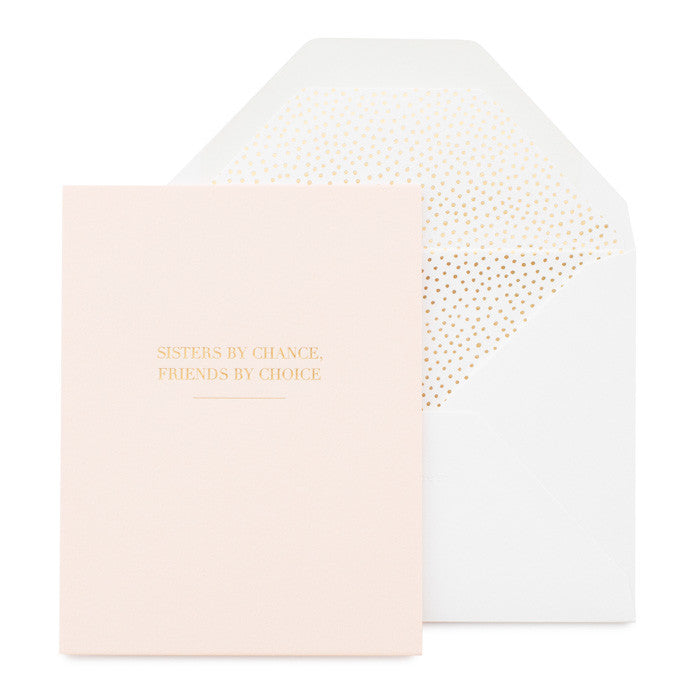 Pink card with gold foil printed Sisters By Chance, Friends By Choice