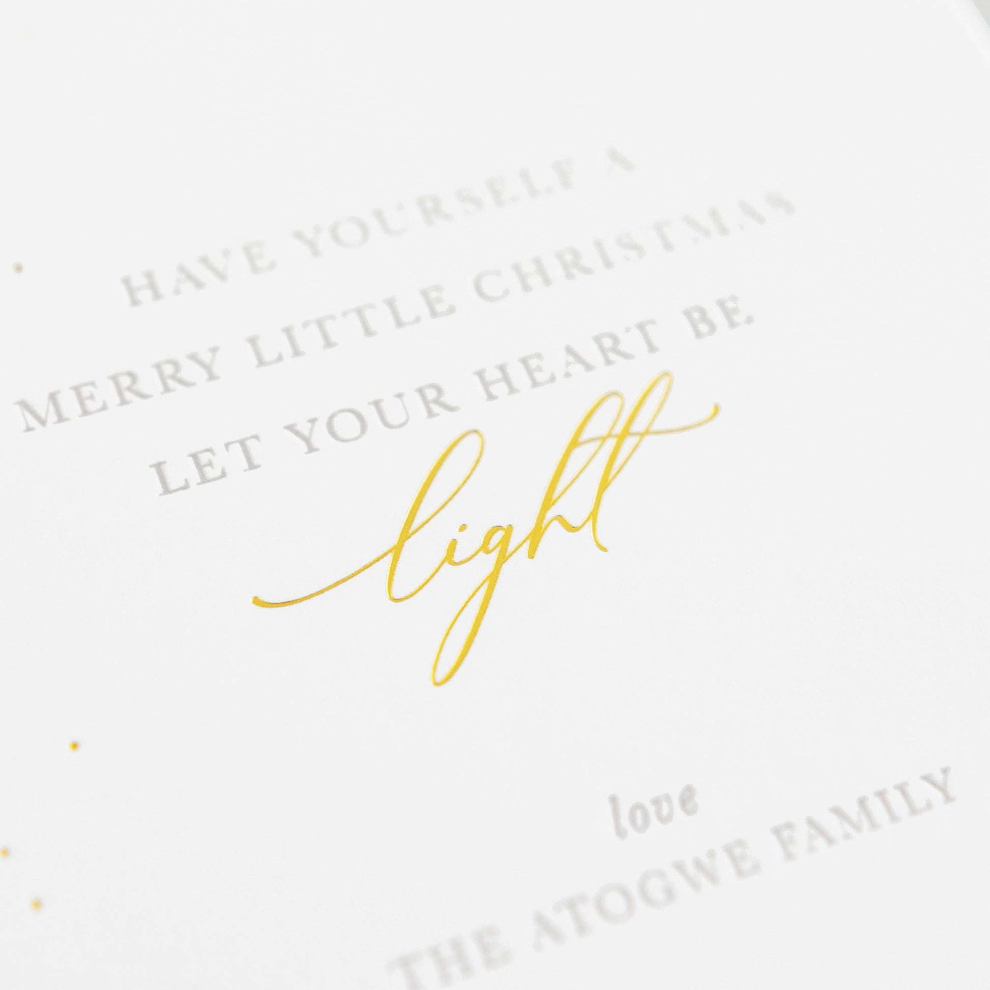 Close up of printing of Have yourself a merry little christmas let your heart be light