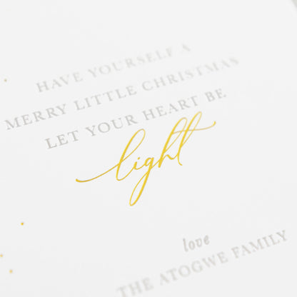 Close up of printing of Have yourself a merry little christmas let your heart be light