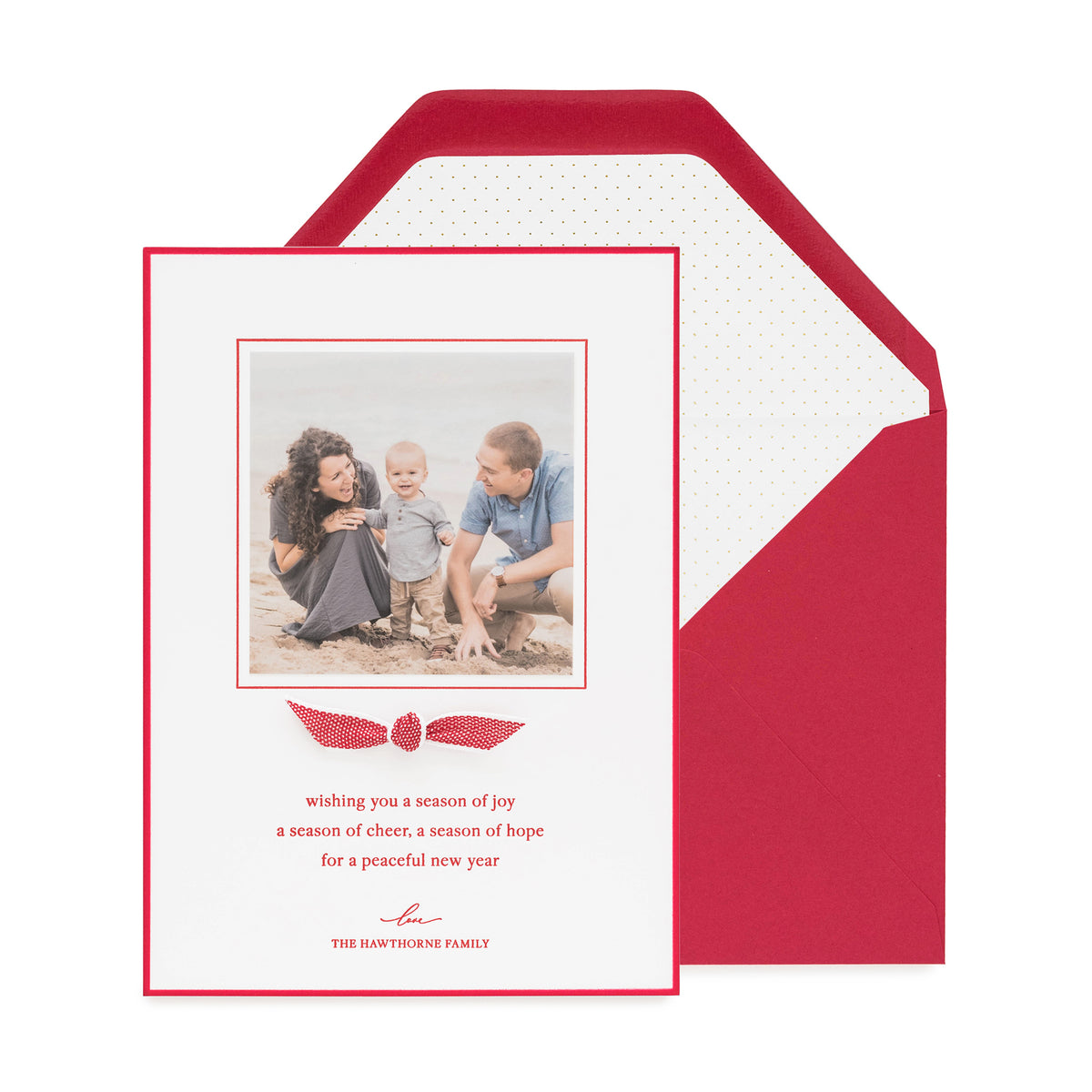 Red holiday photo card with a red and white ribbon