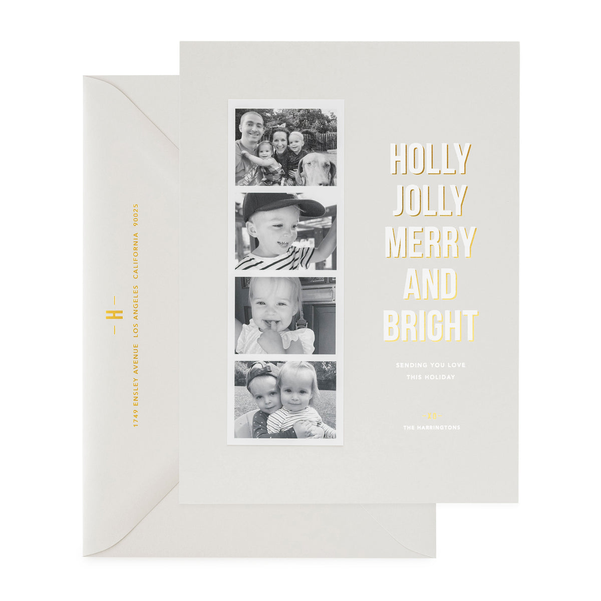 Grey holiday photo card with photo strip with Holly Jolly Merry and Bright showing gold foil address on envelope