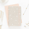 Stack of flax dot and pale pink journals