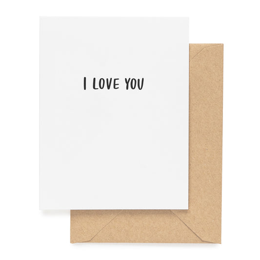 white card with black "I love you", kraft envelope