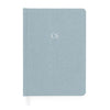 dusty blue journal with white foil monogram