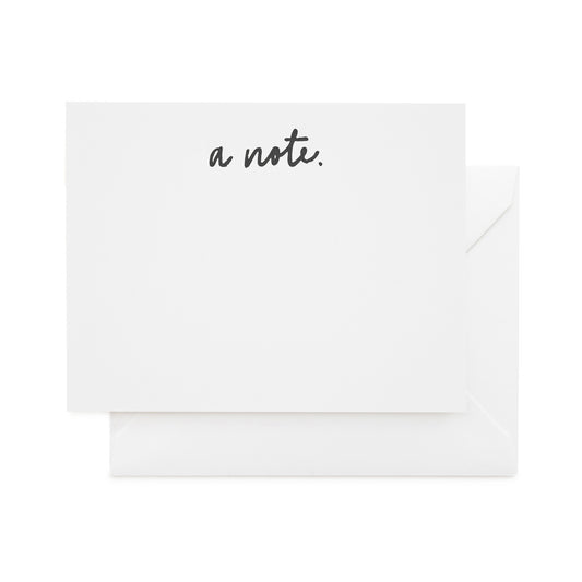 white card with black text and white envelope