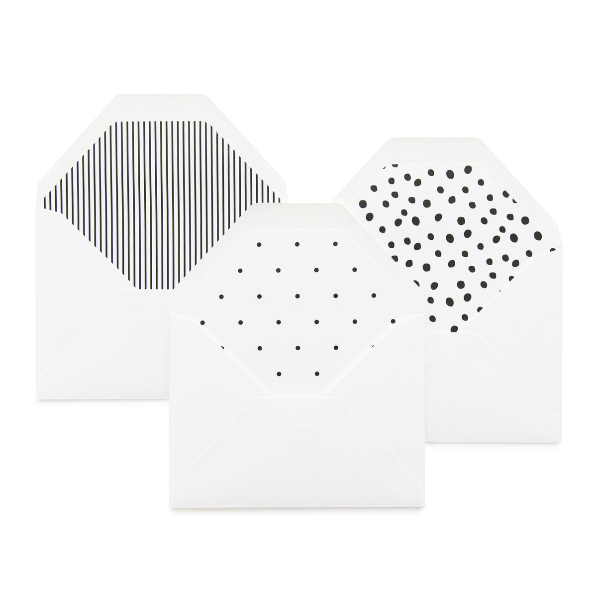 Black and white envelope liners in white envelopes