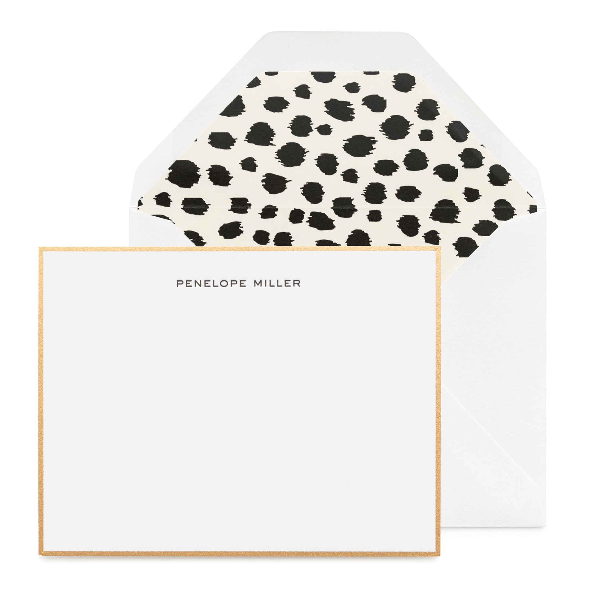 Black and white stationery with gold border and Dalmatian dot liner