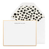 Black and white stationery with gold border and Dalmatian dot liner