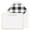 Black and white custom stationery with gold border and check liner