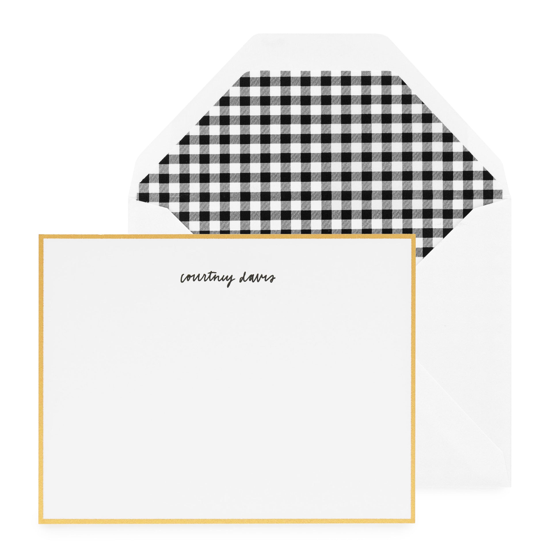 white card with gold border and black text, white envelope with small black buffalo check liner