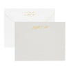 Grey stationery set with gold foil script name and gold return address detail