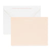 Pale pink stationery set with pink letterpress return address on envelope