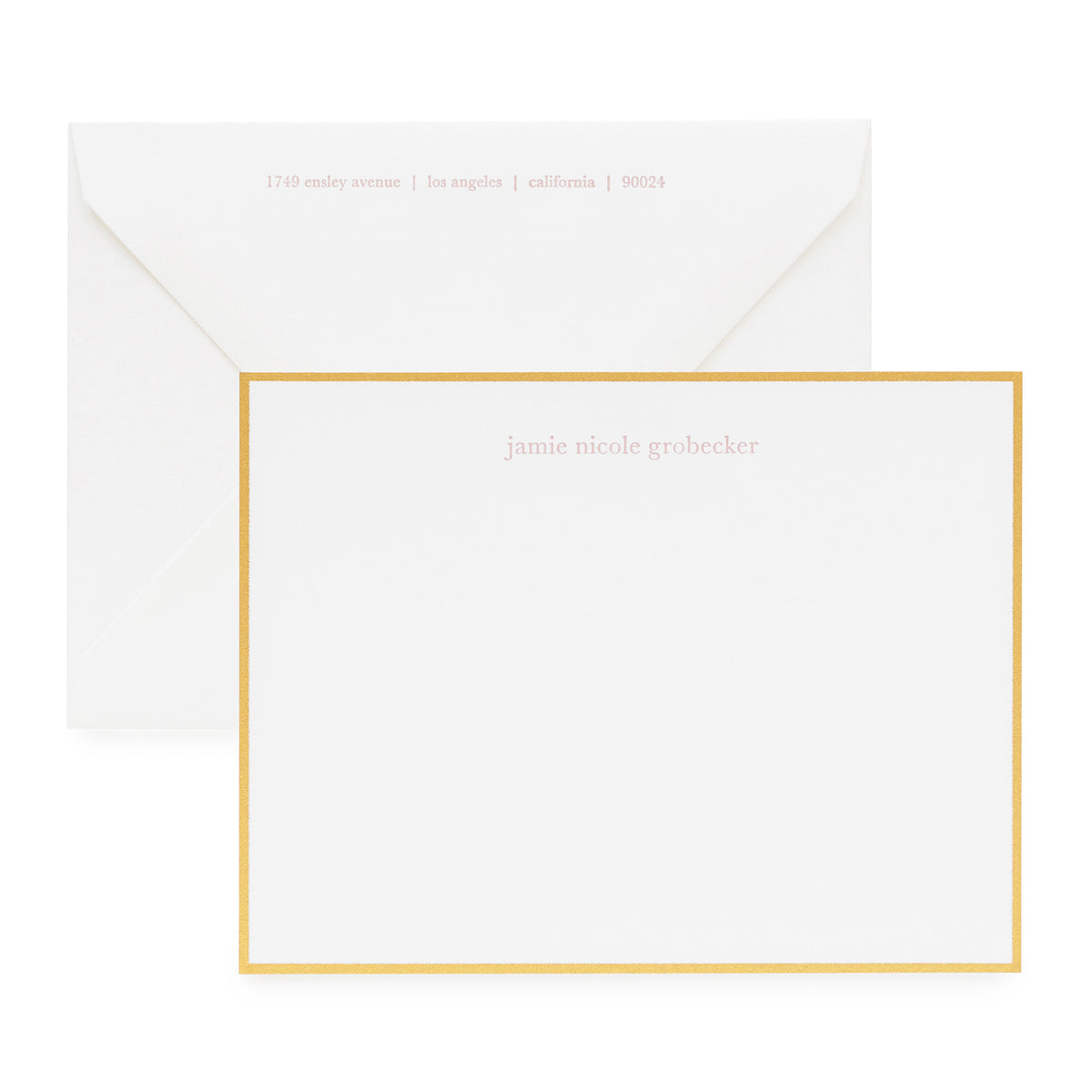 Dusty rose and gold on white custom stationery with return address showing on envelope
