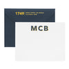 Large initial stationery with navy envelope with large numbers on back of envelope