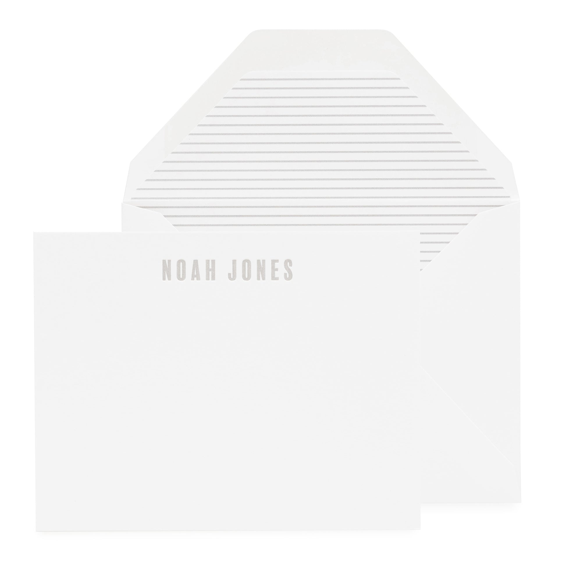 Custom stationery with grey ink on white card showing a stripe liner